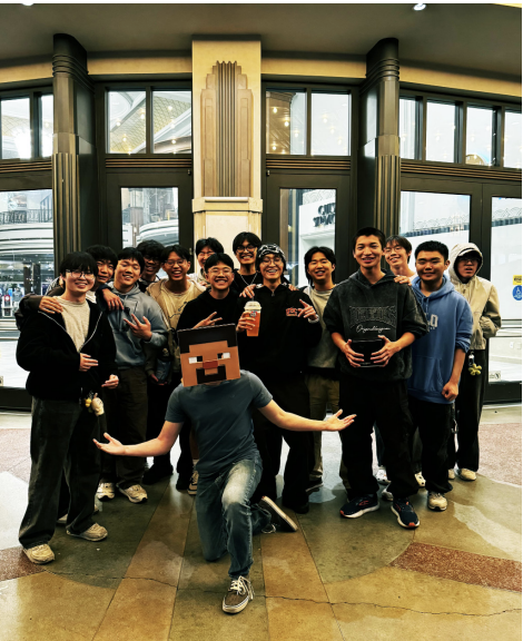 STEVE POSES at theatre with his army of Cubs